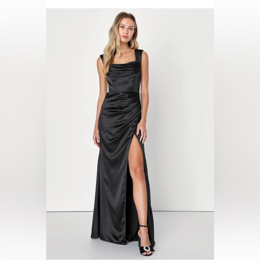Long black satin dress with slit.